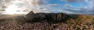 Thessaly Prints: Meteora Greece panorama. Sunset and cloudy sky over Kalabaka town