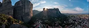 Thessaly Prints: Meteora Greece panorama. Sunset and cloudy sky over Kalabaka town
