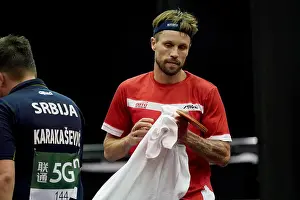 2019 Prints: Michael Maze of Denmark reacts as he competes against Aleksandar Karakasevic of Serbia in the Group 48 match of
