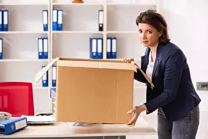 Middle-aged female employee being fired from her work