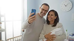 Intimacy Prints: Middle aged hispanic couple smiling indoors