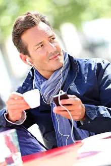 Forties Prints: Middle-aged man talking on phone with handsfree