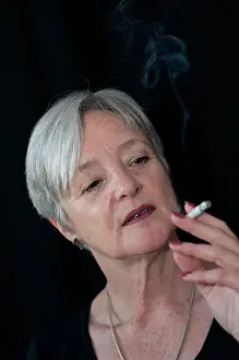 Varnish Prints: Middle aged woman smoking a cigarette