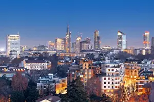 Galleria Prints: Milan, Italy financial district skyline over residential apartments at dusk