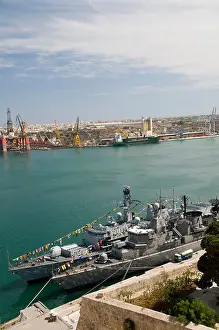 Condo Prints: military armed forces navy boats in grand harbor valletta malta with construction development view from upper barrakka