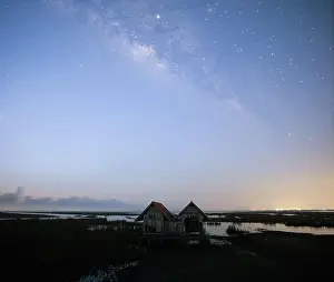 Old House Prints: Milky Way early morning before sunrise, old abandoned house, red roof on open field