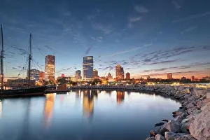 Milwaukee, Wisconsin, USA downtown city skyline on Lake Michigan at sunset