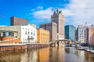 Milwaukee, Wisconsin, USA downtown skyline on the Milwaukee River in the daytime