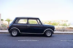 Tenerife Prints: Mini Cooper 1300, 1978 model in black with white roof parked at side of street in Tenerife