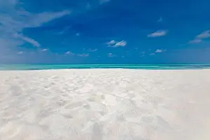 Minimal beach view, sea sand sky as relaxing summer scenery. Peaceful tropical beach landscape view. Clouds on blue sky, tranquil beach nature concept
