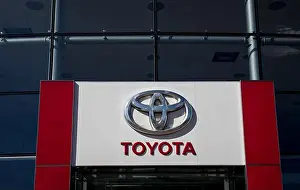 Dealer Prints: Minsk, Belarus, April 10, 2025 - Toyota dealership sign on the building