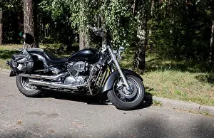 Cruiser Prints: Minsk, Belarus, October 31, 2024 - Yamaha power motorbike on street near forest
