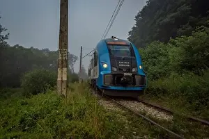 Silesia Prints: Mist morning with electric trains in Rajcza town with Sola river in middle of summer