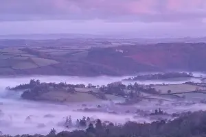 Typically Prints: Mist shrouded Dartmoor countryside near Castle Drogo in winter