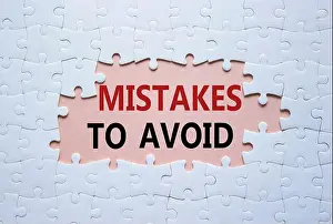 Evidence Prints: Mistakes symbol. Concept words Mistakes to Avoid on white puzzle