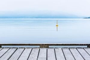 Images Dated 7th July 2017: Misty morning on Norheimsund village. Wooden pier on hardangerfjord, Norway, Europe