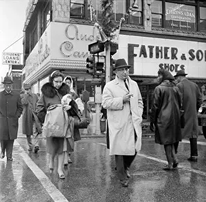 Business District Prints: Mixed-race pedestrian traffic is shown on Chicago's South Side at the intersection of Halsted and 63rd
