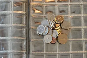 Multicultural Prints: Mixed World Coins Collection on Transparent Coin Album Sheet