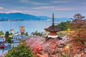 Images Dated 5th April 2017: Miyajima Island, Hiroshima, Japan with temples on the Seto Inland Sea at dusk in the spring season