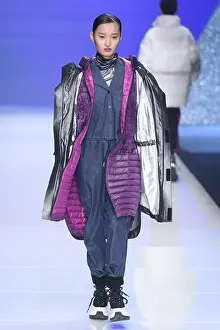 Fall Winter Prints: A model displays a new creation at the fashion show of BLACK CAT&WHITE CAT by Gao Xiaochun during the China Fashion