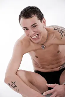 Sits Prints: Model released, Junger Mann mit t?towiertem und gepierctem Oberkoerper - young man with tattoos