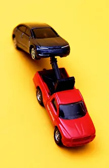 Pulling Prints: Model tow truck and car