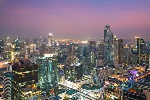 Modern building in Bangkok business district at Bangkok city with skyline in night, Thailand