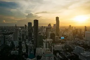 Modern building in Bangkok business district at Bangkok city with skyline during sunset, Thailand