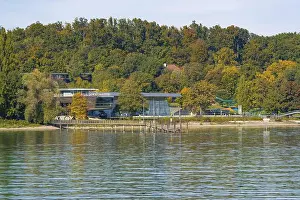River Bank Prints: Modern building on the shore of a lake