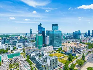 Modern City high rise skyscraper buildings. Aerial drone view of the Financial District Warsaw Daytime