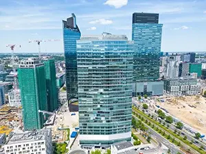 Modern City high rise skyscraper buildings. Aerial drone view of the Financial District Warsaw Daytime