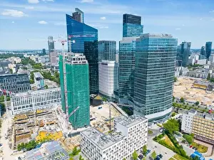Modern City high rise skyscraper buildings. Aerial drone view of the Financial District Warsaw Daytime