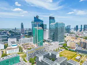 Modern City high rise skyscraper buildings. Aerial drone view of the Financial District Warsaw Daytime