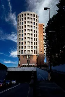 Cylindrical Prints: Modern cylindrical building captured at sunset