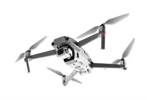 Quadcopter Prints: Modern drone with camera isolated on white