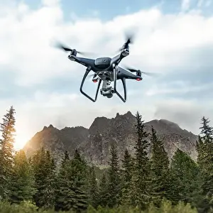 Videography Prints: Modern drone flies in the mountains