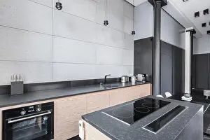 Functional Prints: Modern kitchen with island and functional black worktop