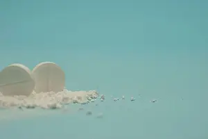 Pharmaceutical Prints: Modern medical concept with tablets and natural elements on blue background