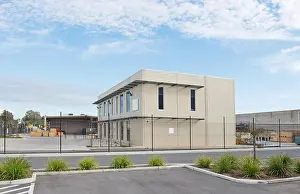 Lease Prints: Modern office building with industrial warehouse and workshop on the rear plan