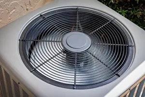 Conditioning Prints: Modern residential HVAC air conditioner unit fan top view