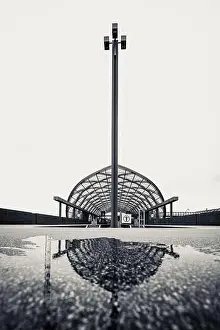 Mirroring Prints: Modern stop of a subway reflected in a puddle. Line U4 Elbbrücken in Hamburg, Germany