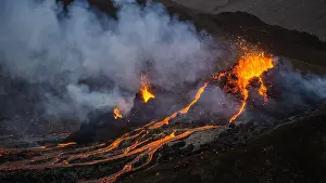Lava Prints: Molten lava flowing from a small volcanic eruption in Mt Fagradalsfjall