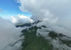 Mombacho volcano crater aerial drone view in cloudy weather
