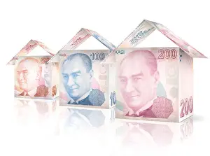 Rent Prints: Money bills folded like houses standing next to each other declining in size and value