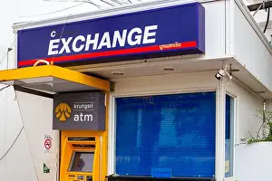 Exchange Rate Prints: Money exchange office and ATM. Problems with withdrawing money and their high exchange rate