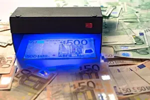 Infrared Prints: Money fake testing - euro banknotes authentication check in UV Currency Detector lights