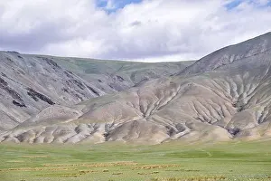 Mountainscape Prints: Mongolian mountain natural landscapes with eroded foothill slopes near lake Tolbo-Nuur in north Mongolia
