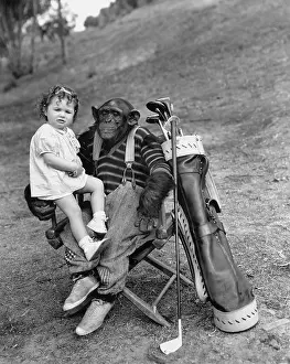 Frowning Prints: Monkey with golf clubs and toddler girl