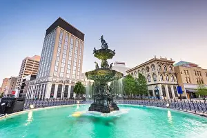 Montgomery, Alabama, USA fountain and downtown cityscape at twilight