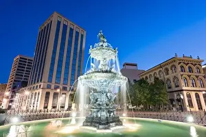 Montgomery, Alabama, USA fountain and downtown cityscape at twilight